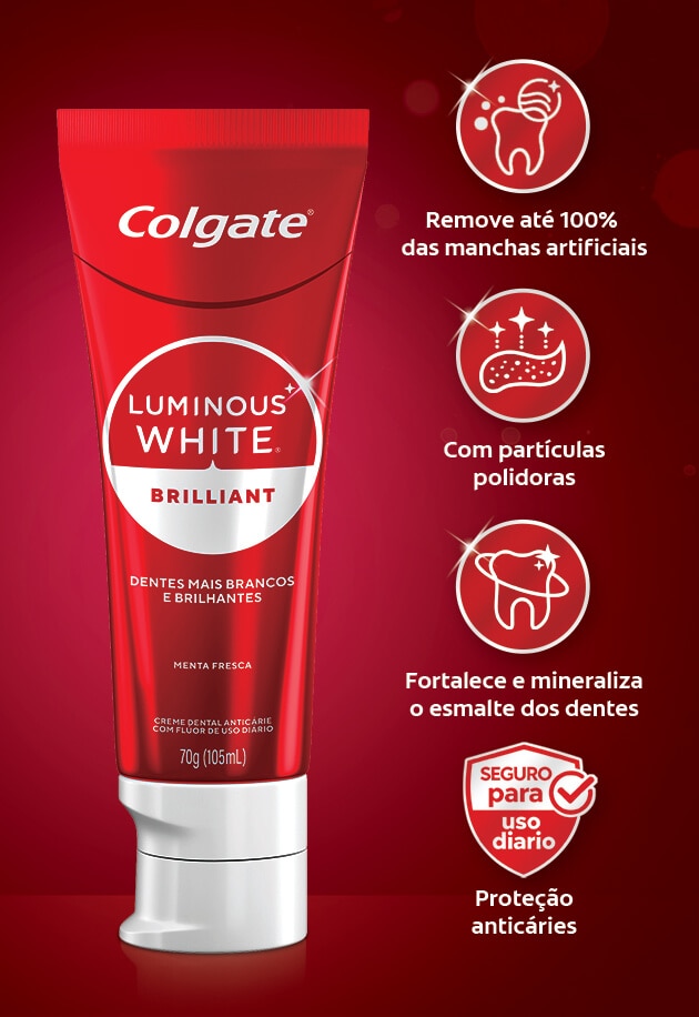 Creme dental Colgate Luminous White Brilliant com partículas polidoras que removem manchas e fortalecem o esmalte dos dentes.