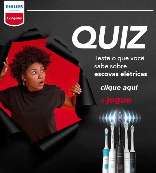 Clique na imagem, com um menino usando um escorredor de macarrão como chapéu, para participar do quiz sobre escova de dente elétrica